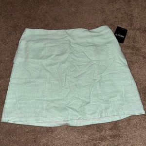 - mint and white skirt size large